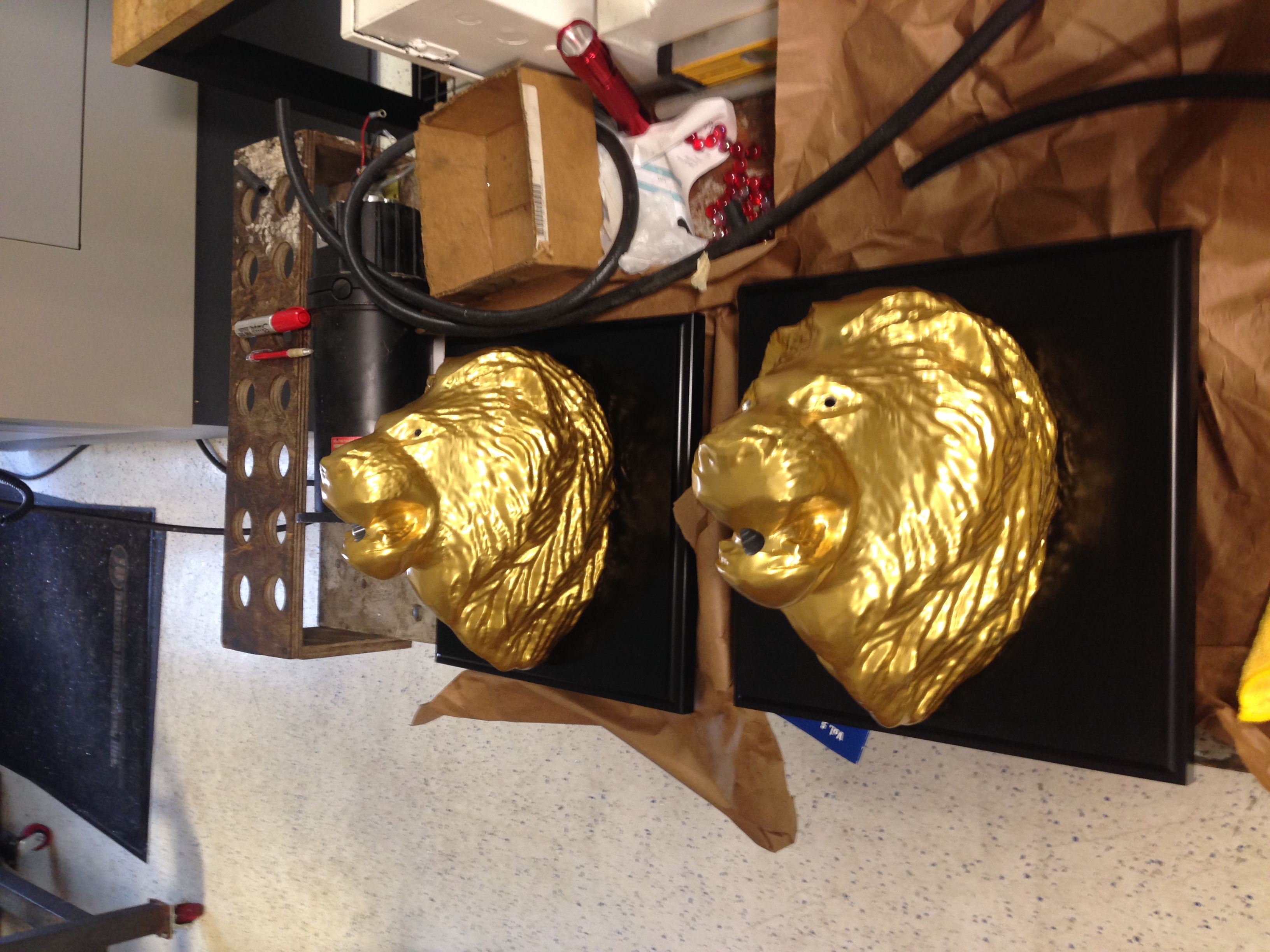 Gold Anodized Lion's Heads with Black Anodized Mount Plates 